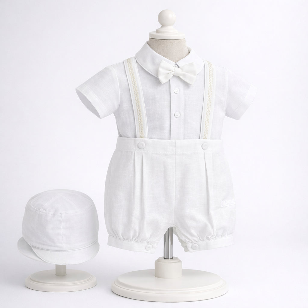 Mameluco de bautizo blanco para bebé niño con tirantes, corbatín y gorro
