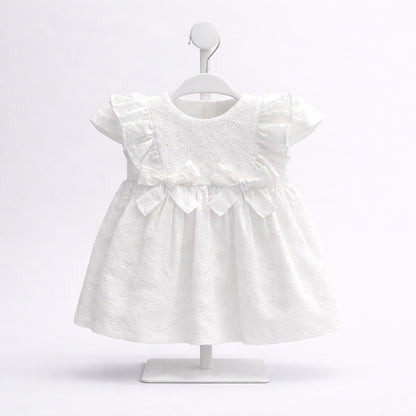 Vestido blanco para bebé niña con bordado y moño frontal